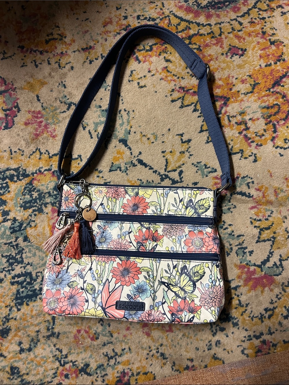 Sakroots Floral Crossbody Bag with Tassel Accent - Navy Strap